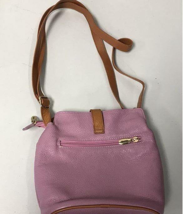 Pink lavender pebbled leather bucket-style crossbody bag with tan leather strap, view 3