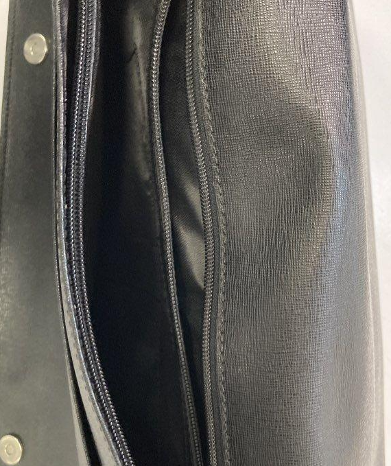 Black leather flap-front messenger bag with adjustable shoulder strap, view 4
