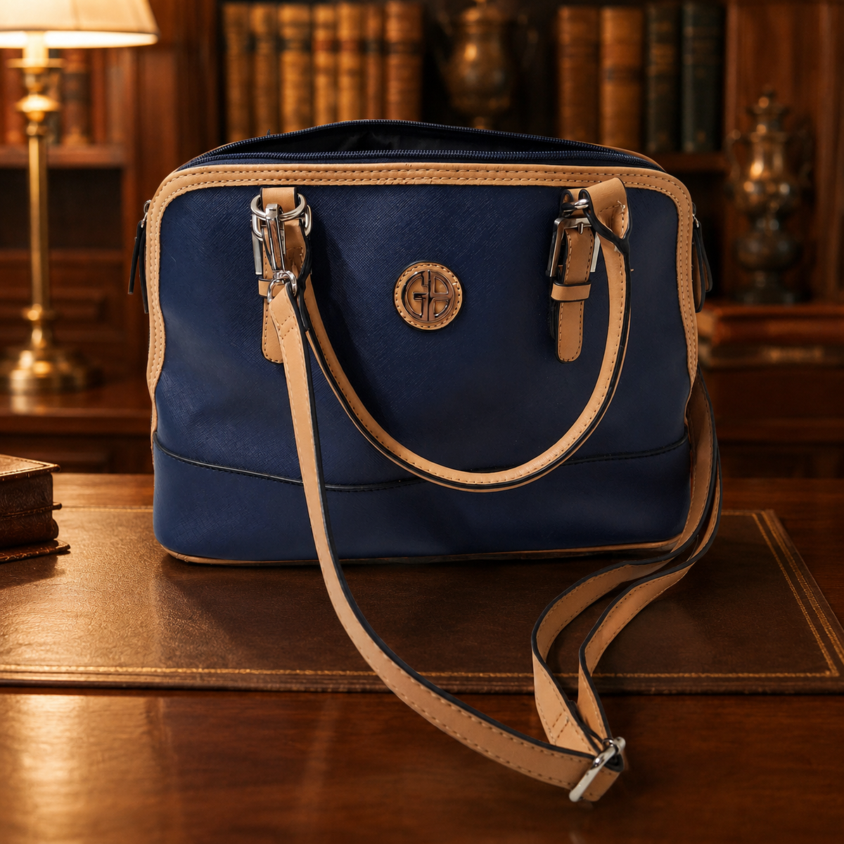 Giani Bernini navy blue satchel with tan trim, gold-tone hardware and crossbody strap