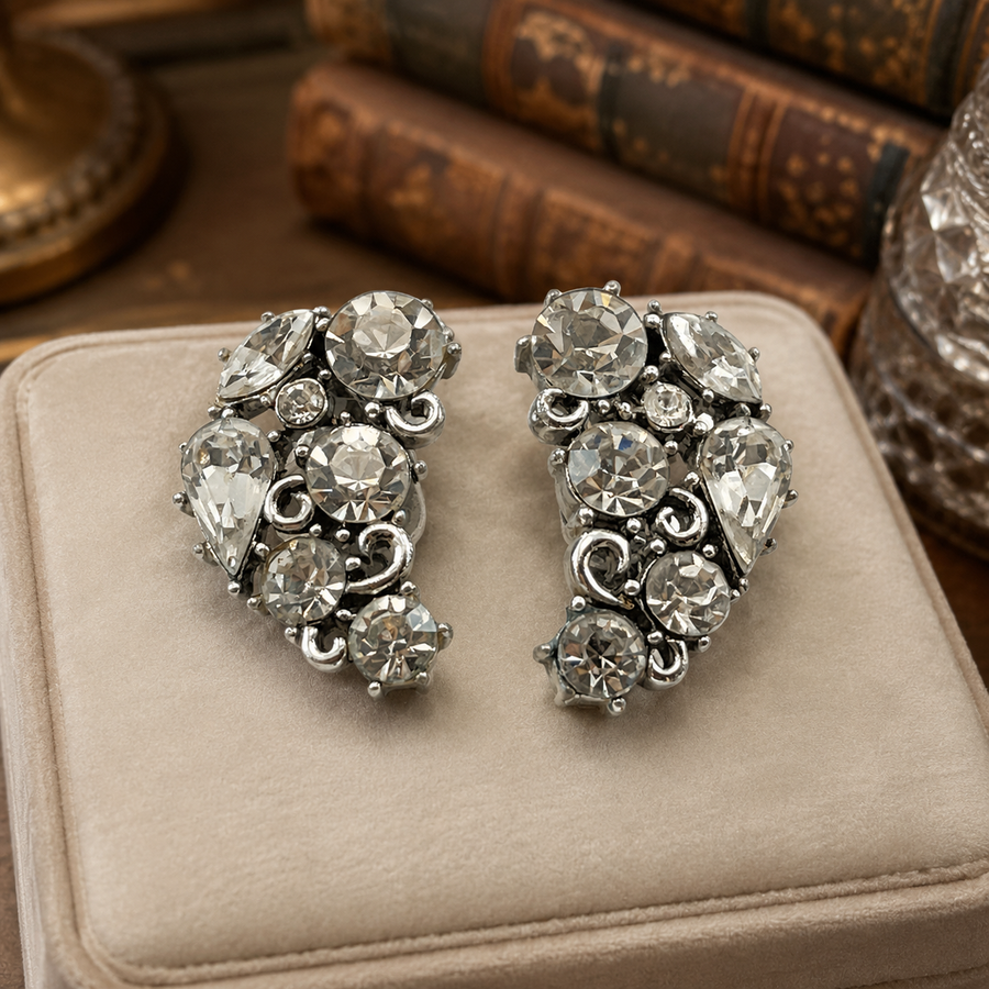 Signed Lisner silver-tone clip-on earrings with clear rhinestones