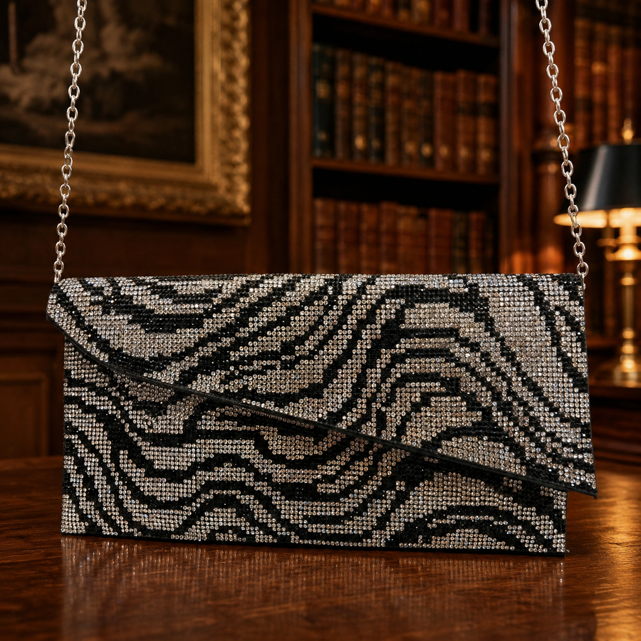 Black and silver zebra pattern rhinestone evening clutch with silver-tone chain strap