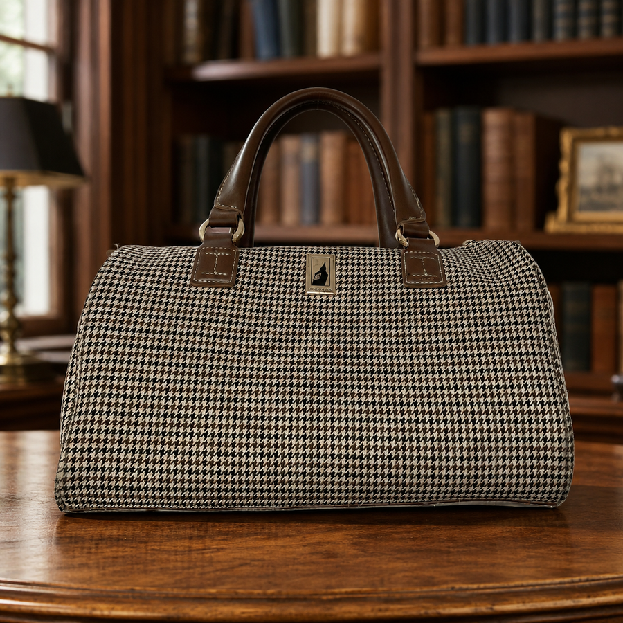 London Fog houndstooth barrel duffel satchel with brown trim and double top handles