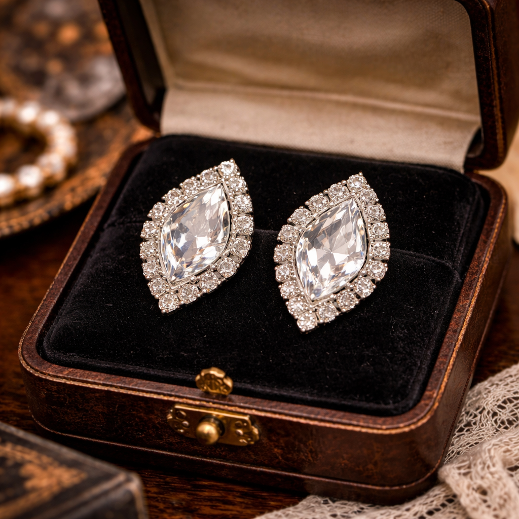 Signed Weiss silver-tone clip-on earrings with white marquise rhinestone halo