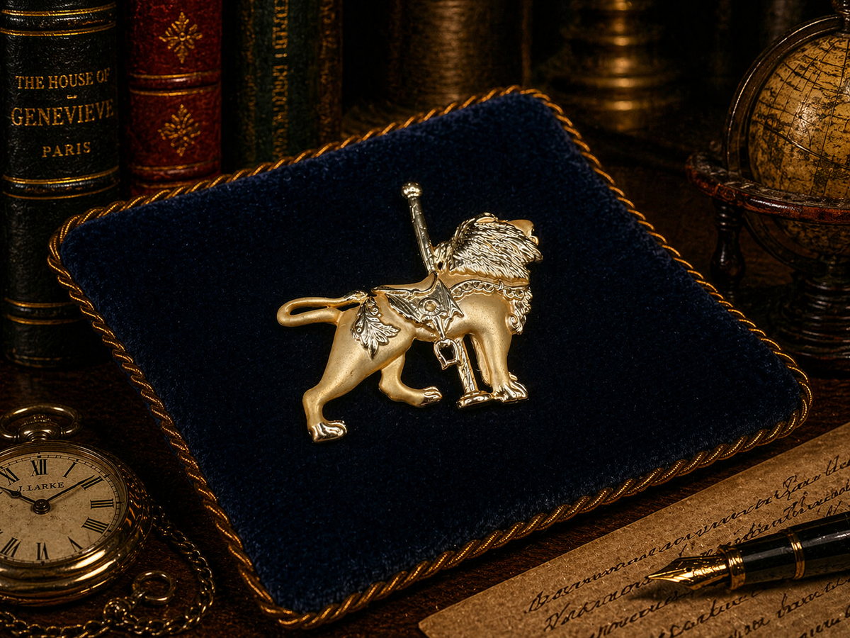Gold-tone carousel lion brooch with textured mane, saddle and pole