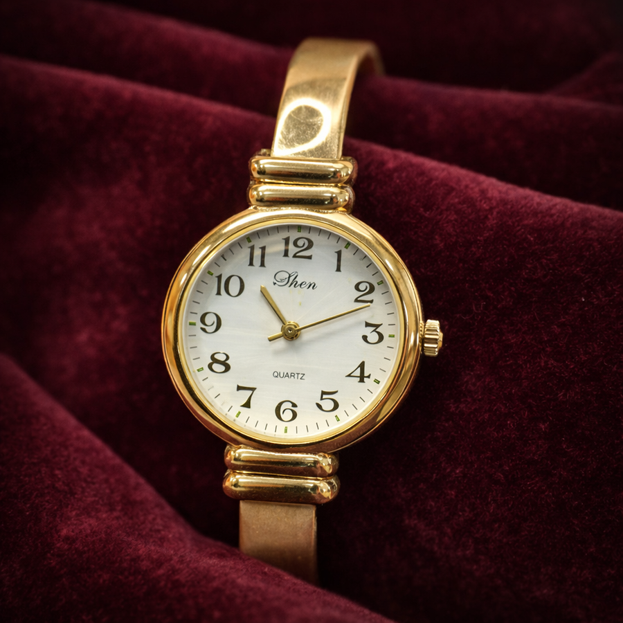Eikon gold-tone ladies quartz wristwatch with white dial, for parts or repair