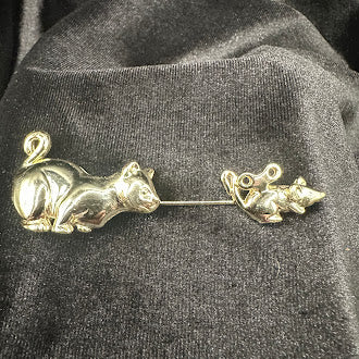 Signed AJC gold-tone bar pin with a cat at one end and a mouse at the other, view 2