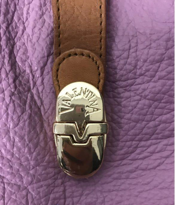 Pink lavender pebbled leather bucket-style crossbody bag with tan leather strap, view 4