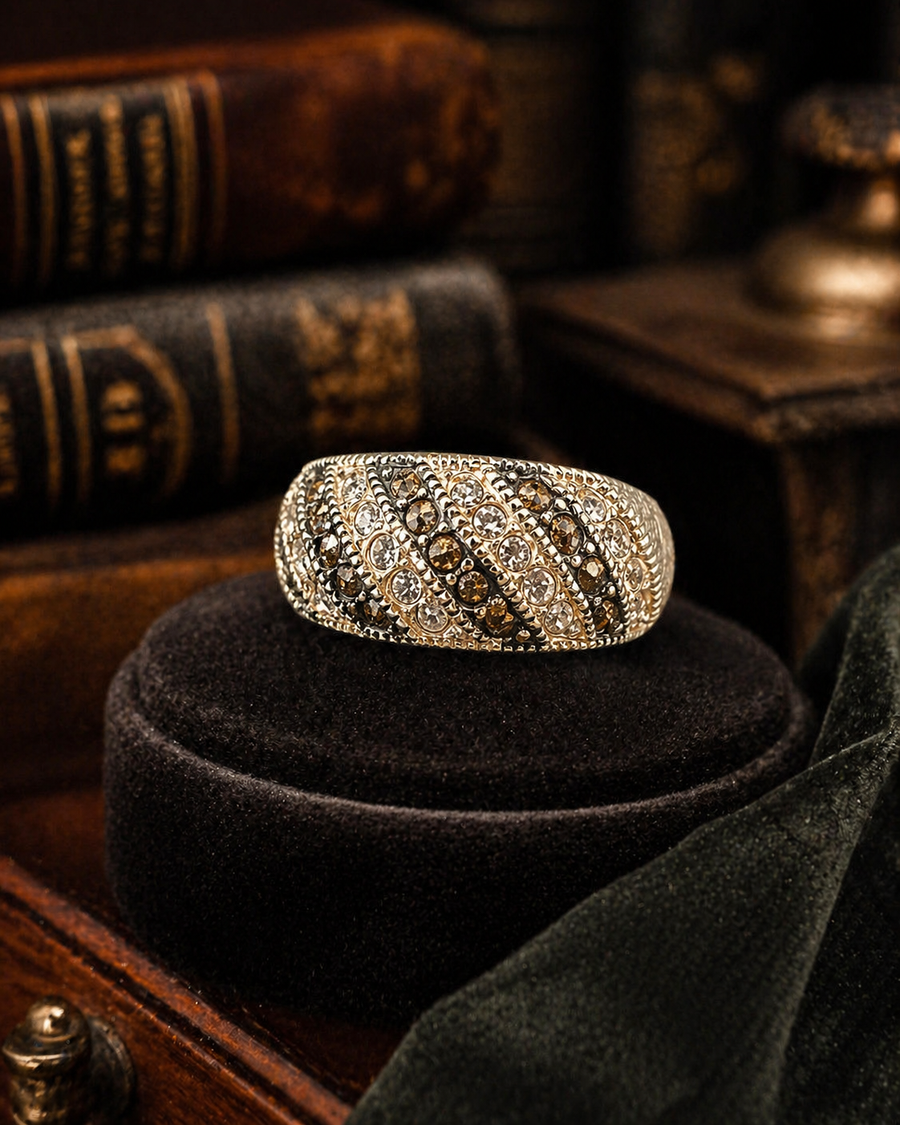 Silver-tone band ring with rows of clear crystals and black crystal stripes