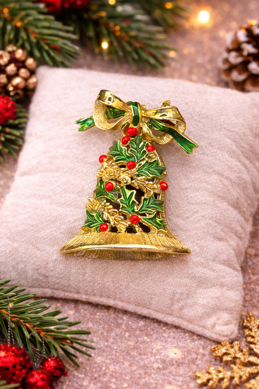 Signed Gerry's gold-tone Christmas bell brooch with green enamel holly and red berries