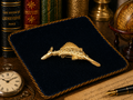Gold tone marlin brooch with textured fin detail