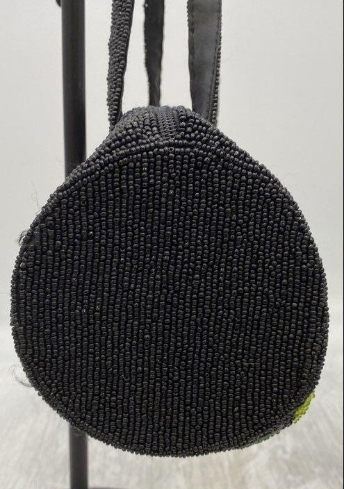 Black beaded cylindrical shoulder bag with red, white and green Coca-Cola script motif, view 7