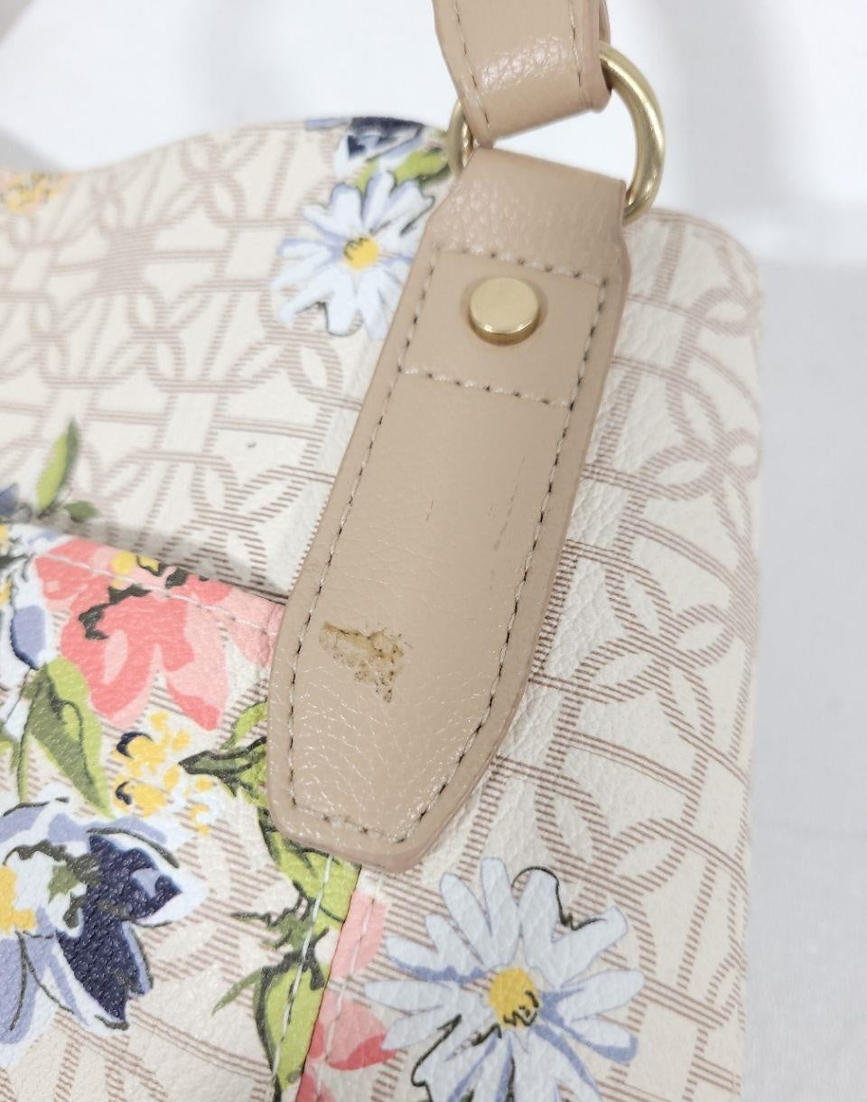 Floral print tote bag with light background and beige shoulder straps, view 5