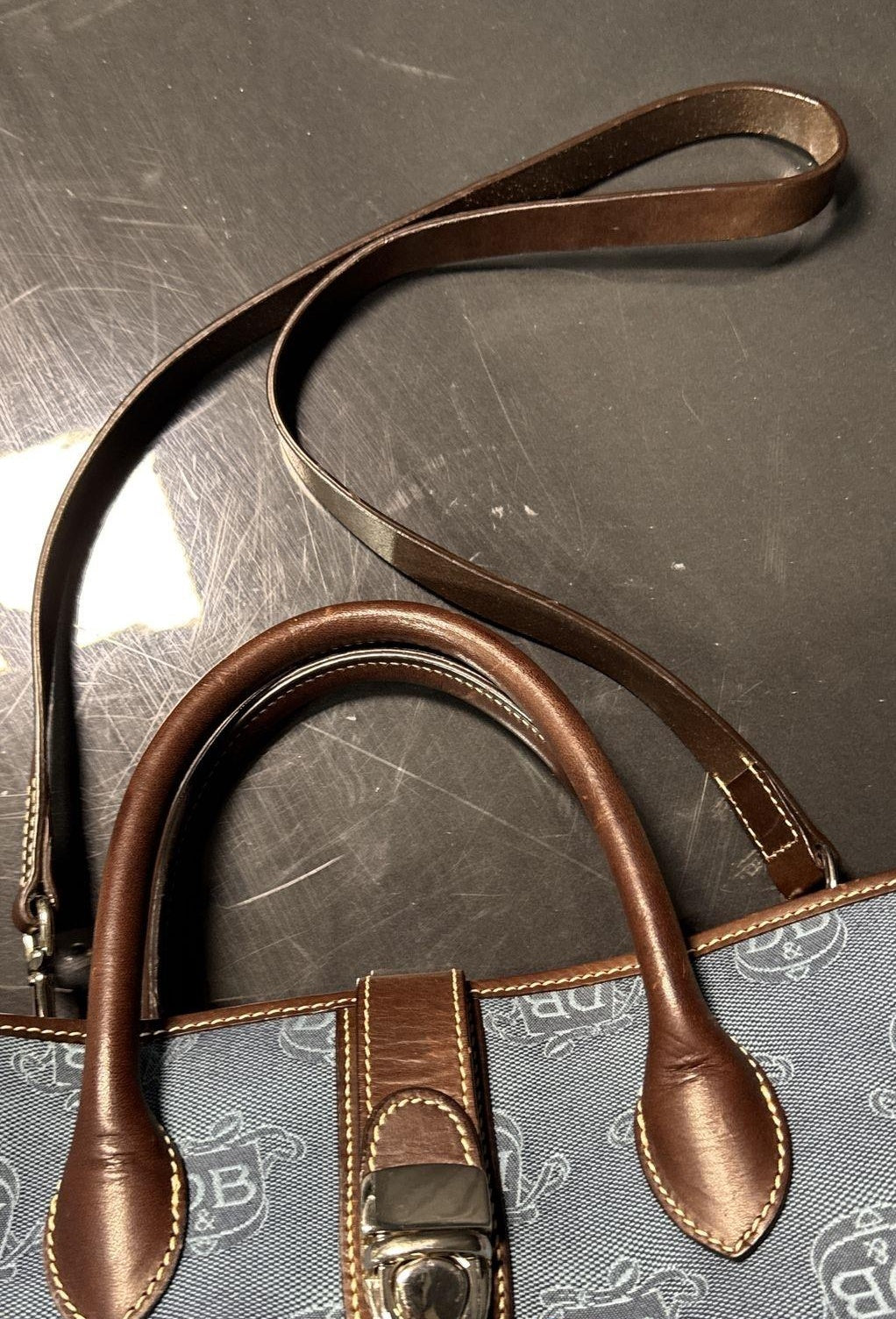 Blue monogram canvas satchel tote with brown leather trim and rolled top handles, view 6