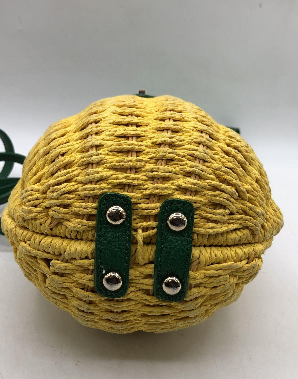 Pineapple-shaped crossbody bag with woven yellow body and green leaf top, view 5