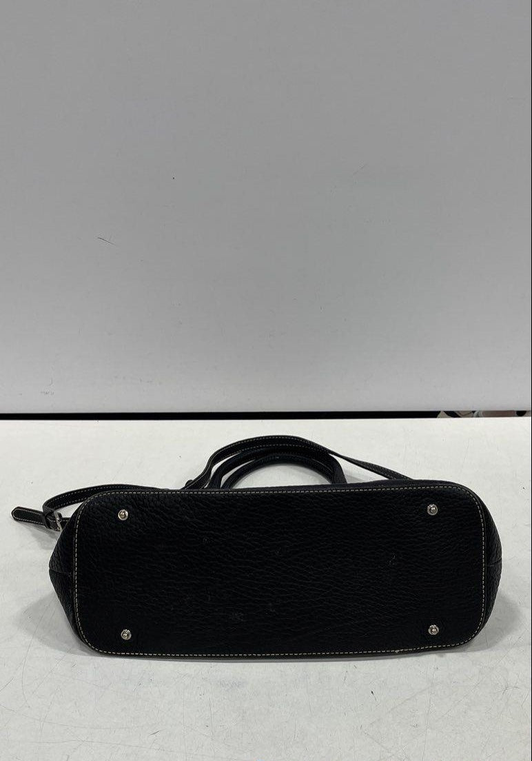 Black pebbled leather dome shoulder bag with contrast stitching, top handles and shoulder strap, view 4