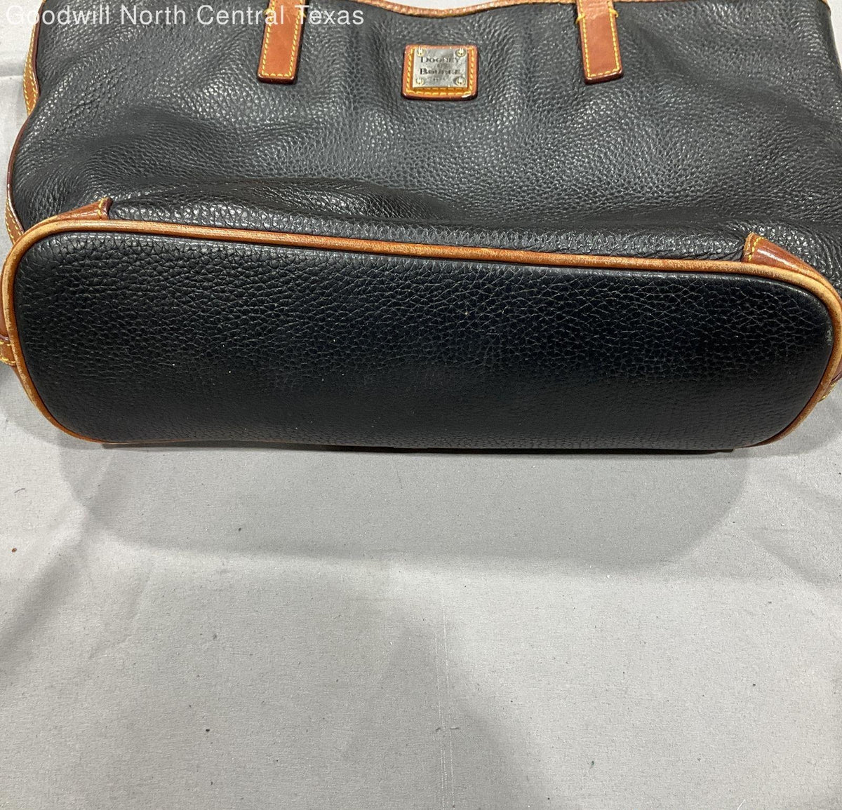 Black pebble grain shoulder bag with brown trim and long double straps, sold for repair or parts, view 6