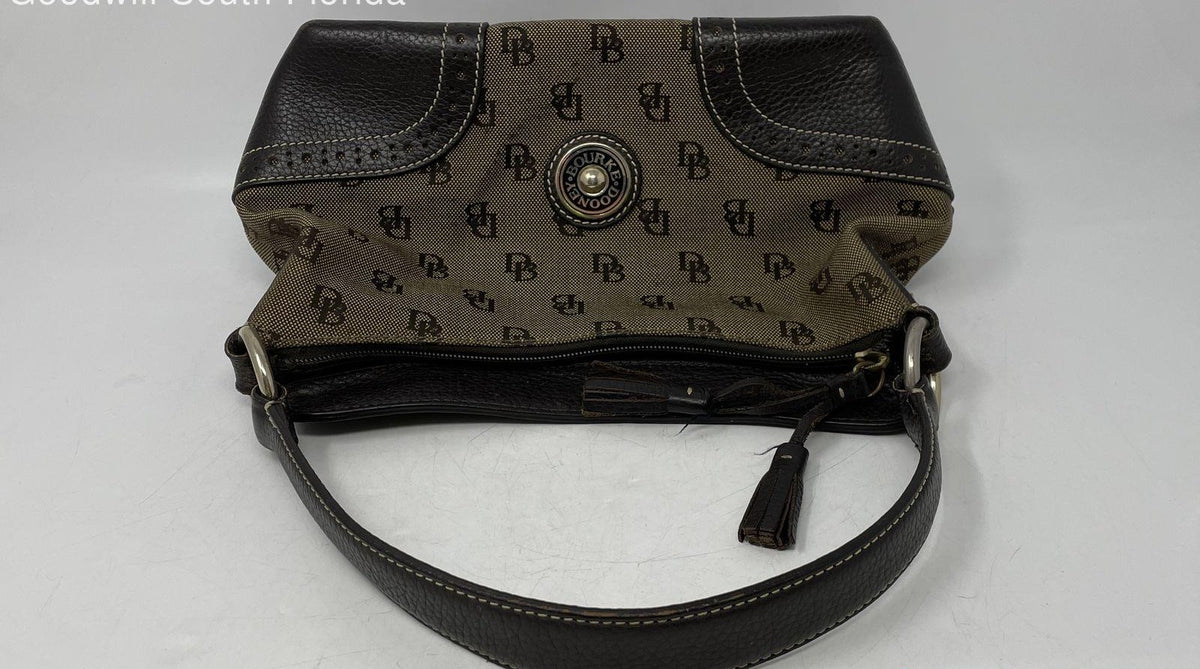 Brown signature canvas shoulder handbag with dark leather trim and tassel zipper pull, view 3