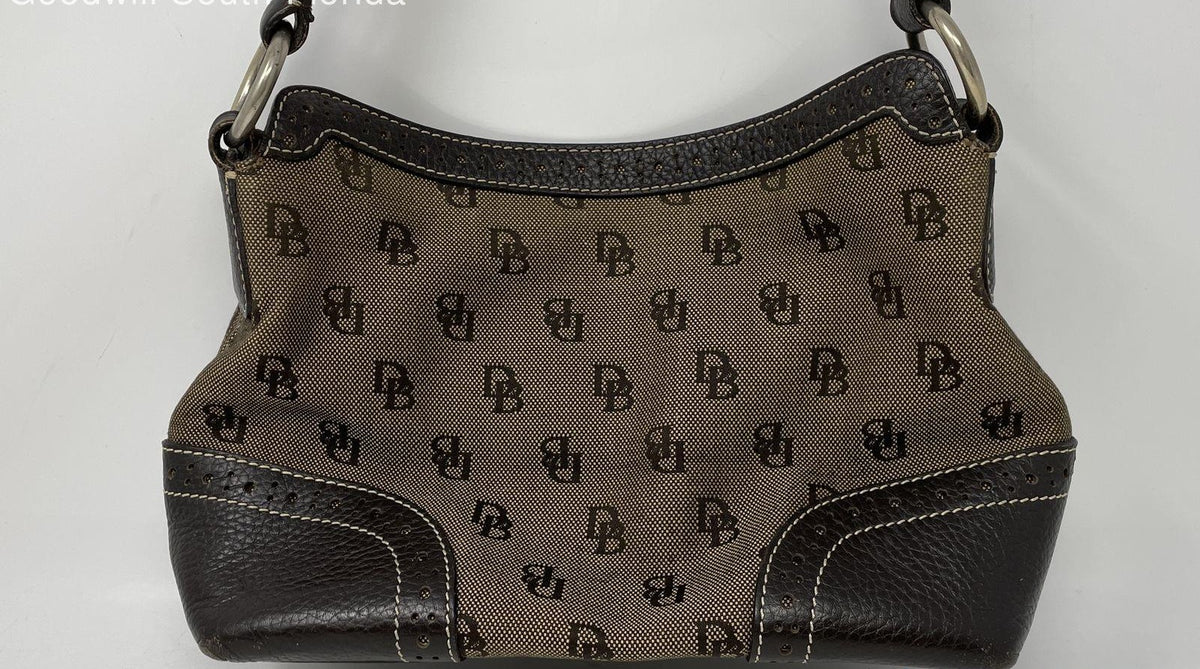 Brown signature canvas shoulder handbag with dark leather trim and tassel zipper pull, view 6