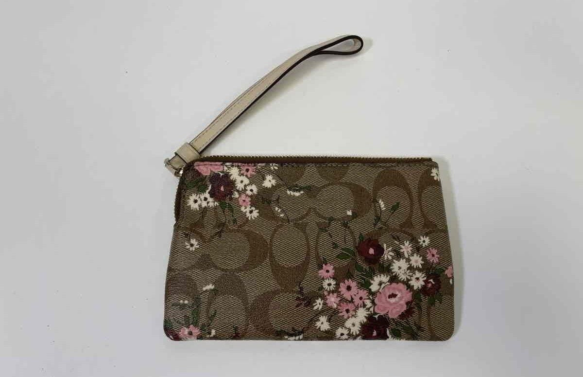 Brown signature jacquard wristlet with small floral print, zip top and wrist strap, view 10