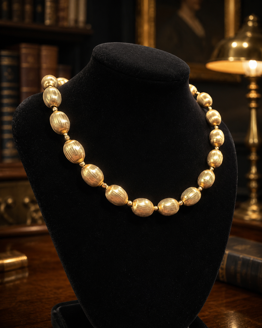 Signed Trifari gold-tone textured oval bead necklace