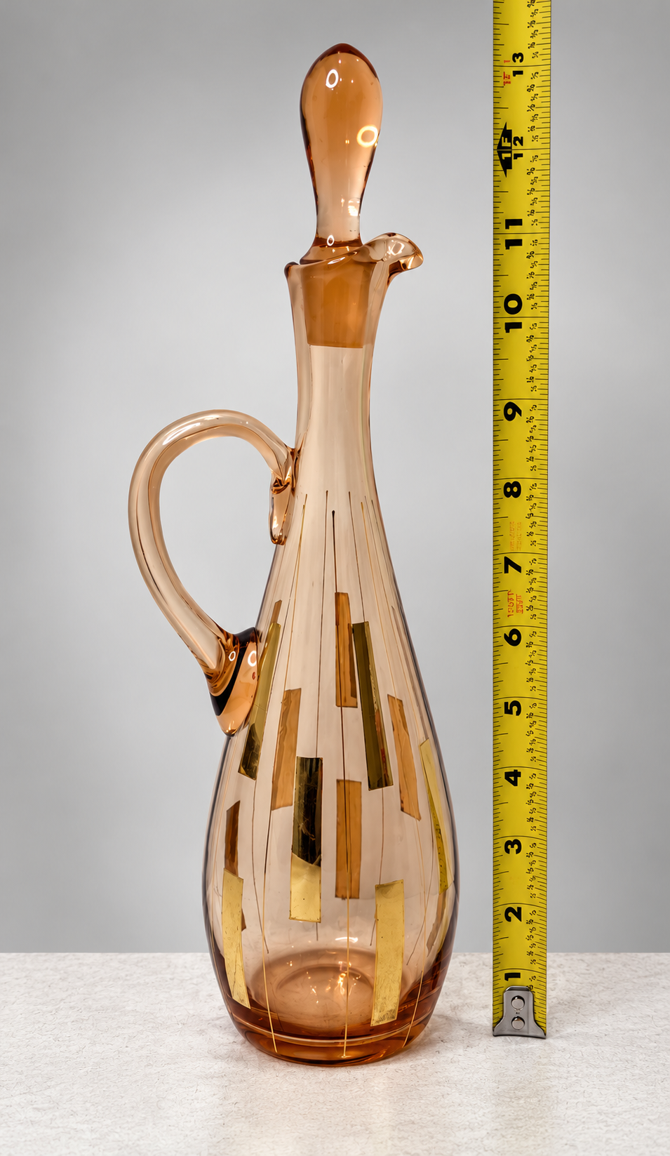 Rose-gold glass handled decanter and six cordial glasses with geometric gold-tone rectangles, view 5