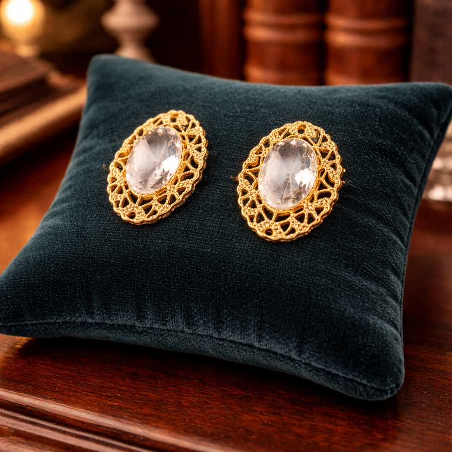 1960s–70s Sarah Coventry Gold Tone Filigree Clip Earrings Oval Clear Crystal Cabochon Statement Jewelry