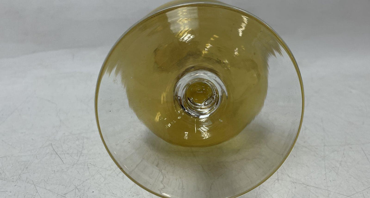 Amber glass decanter pitcher with flared spout, clear twisted stem and looping clear handle, view 9