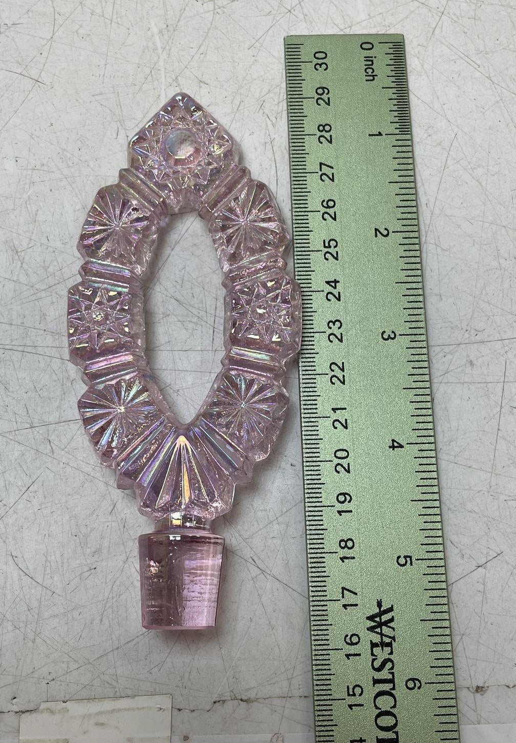 Pink iridescent carnival glass footed decanter with starburst panels and pierced oval stopper, view 5