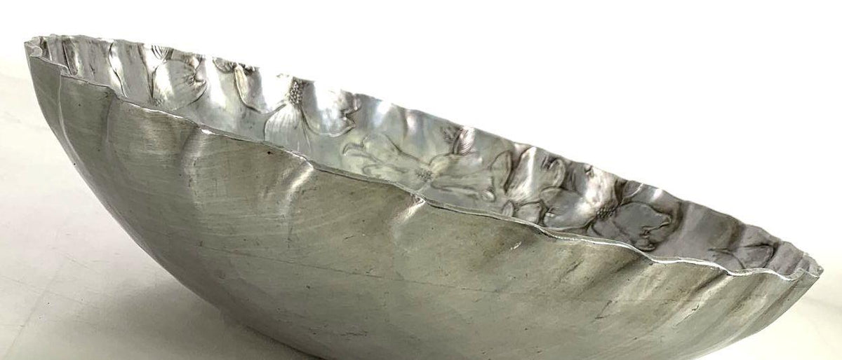 Hammered aluminum serving bowl with raised dogwood blossoms and scalloped rim, view 5