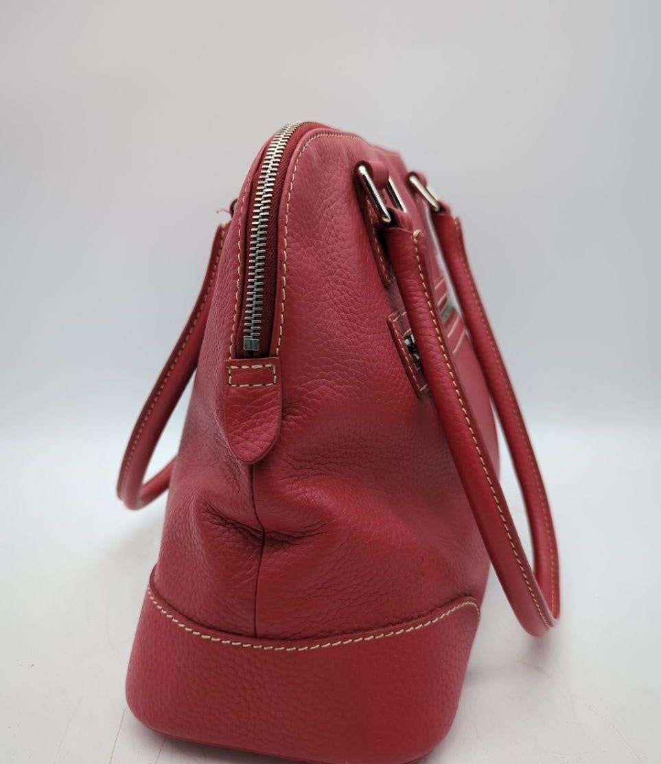 Dooney and Bourke red pebbled leather domed satchel with cream contrast stitching and rolled handles, view 5