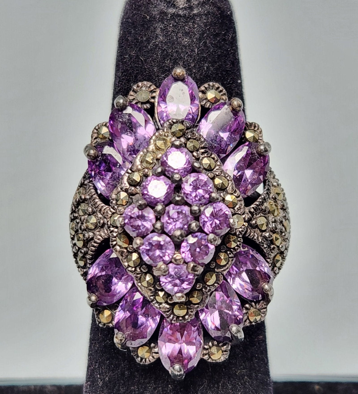 Sterling silver cocktail ring stamped 925 with purple stones and marcasite accents, view 2