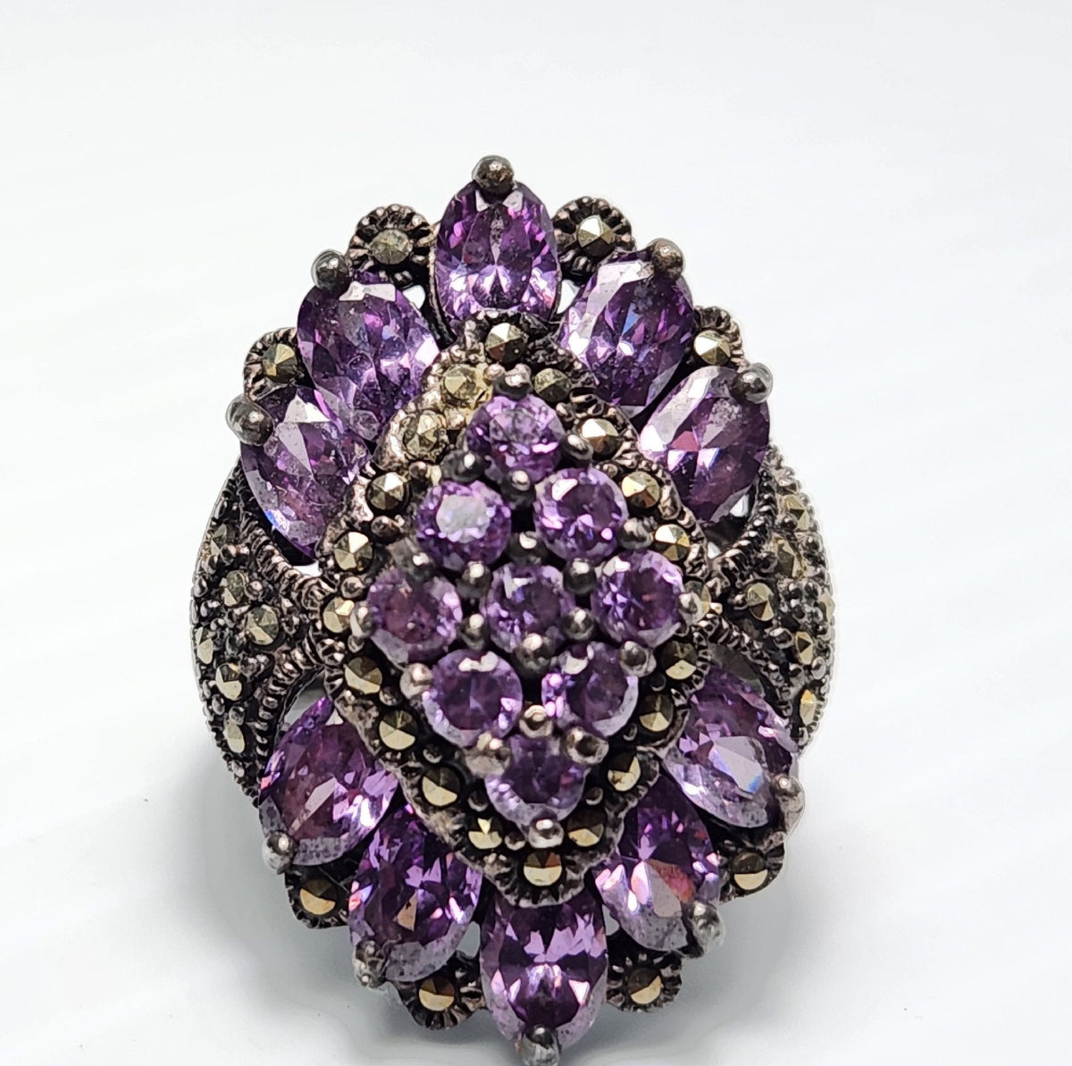 Sterling silver cocktail ring stamped 925 with purple stones and marcasite accents, view 3