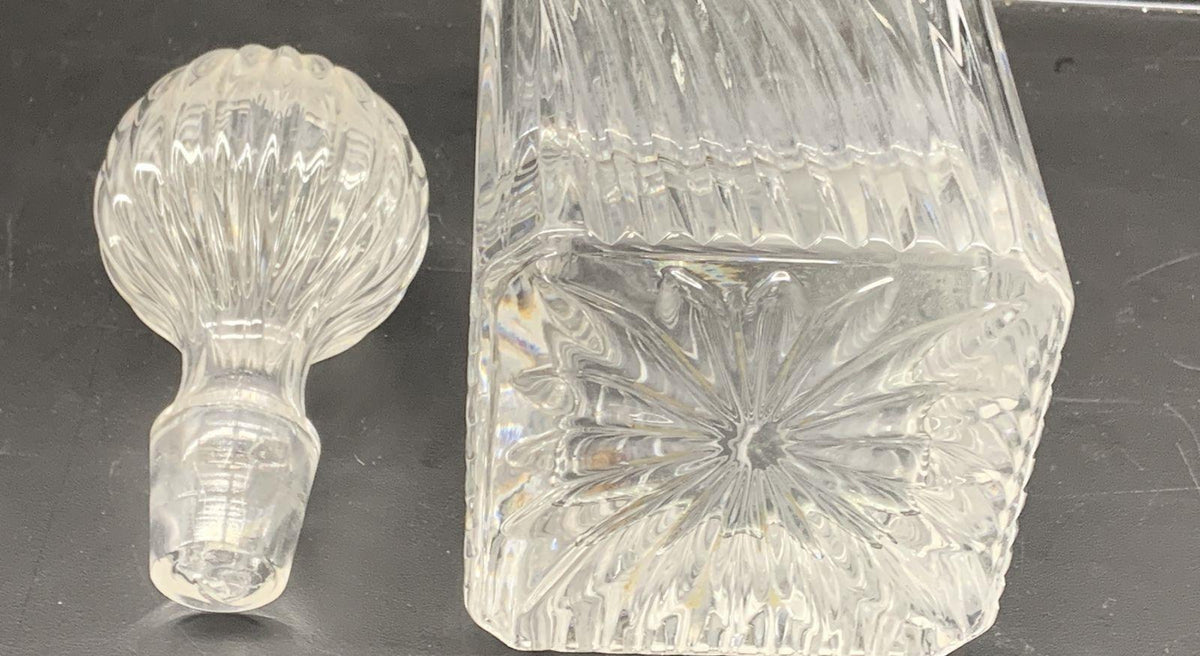 Cristallerie Lori clear crystal decanter with faceted rectangular body, swirl cutting and ribbed globe stopper, view 5