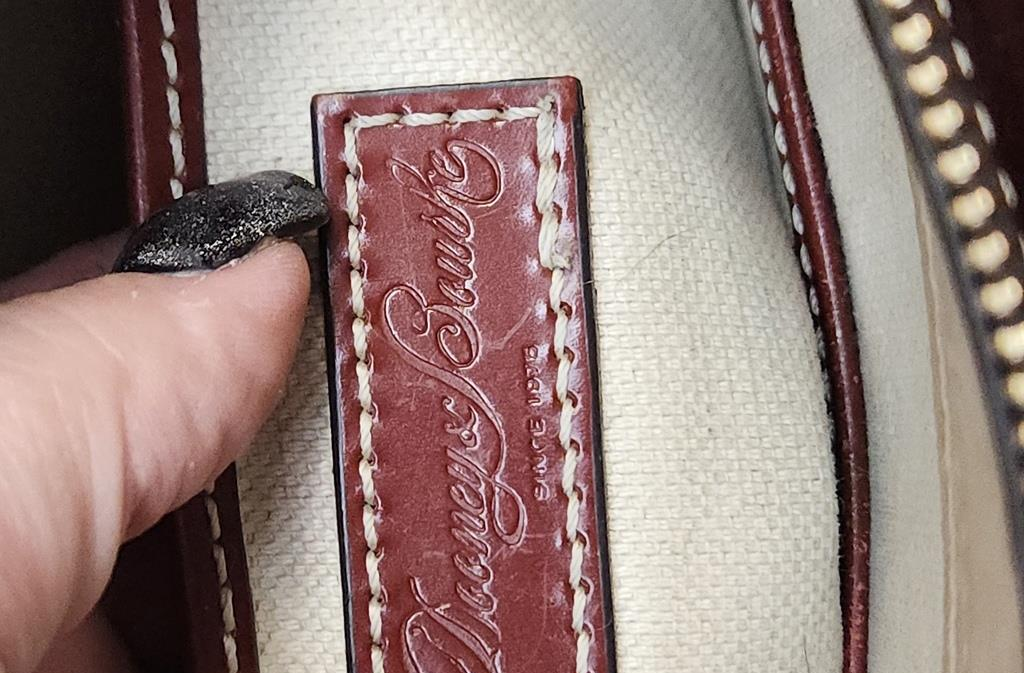 Dooney & Bourke reddish brown smooth leather satchel with rolled handles and crossbody strap, view 10