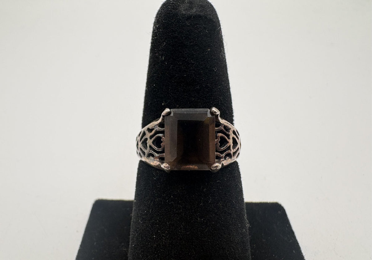 Silver ring with rectangular smoky brown stone in four prongs and openwork filigree shoulders, view 2