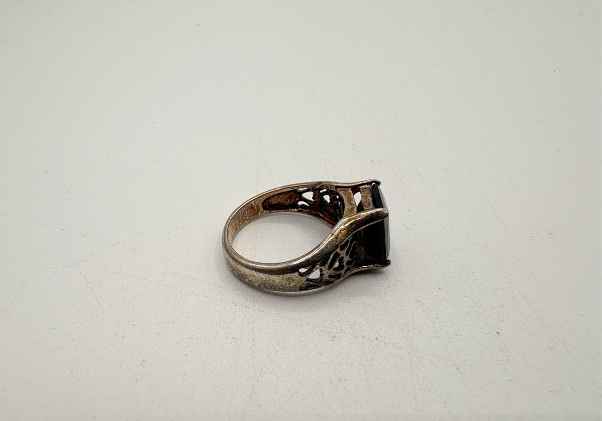 Silver ring with rectangular smoky brown stone in four prongs and openwork filigree shoulders, view 4