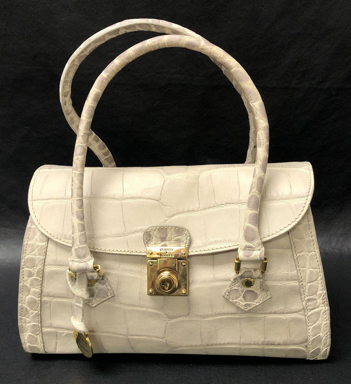 Dooney and Bourke white croc-embossed satchel with gold-tone turn-lock and logo medallion, view 2