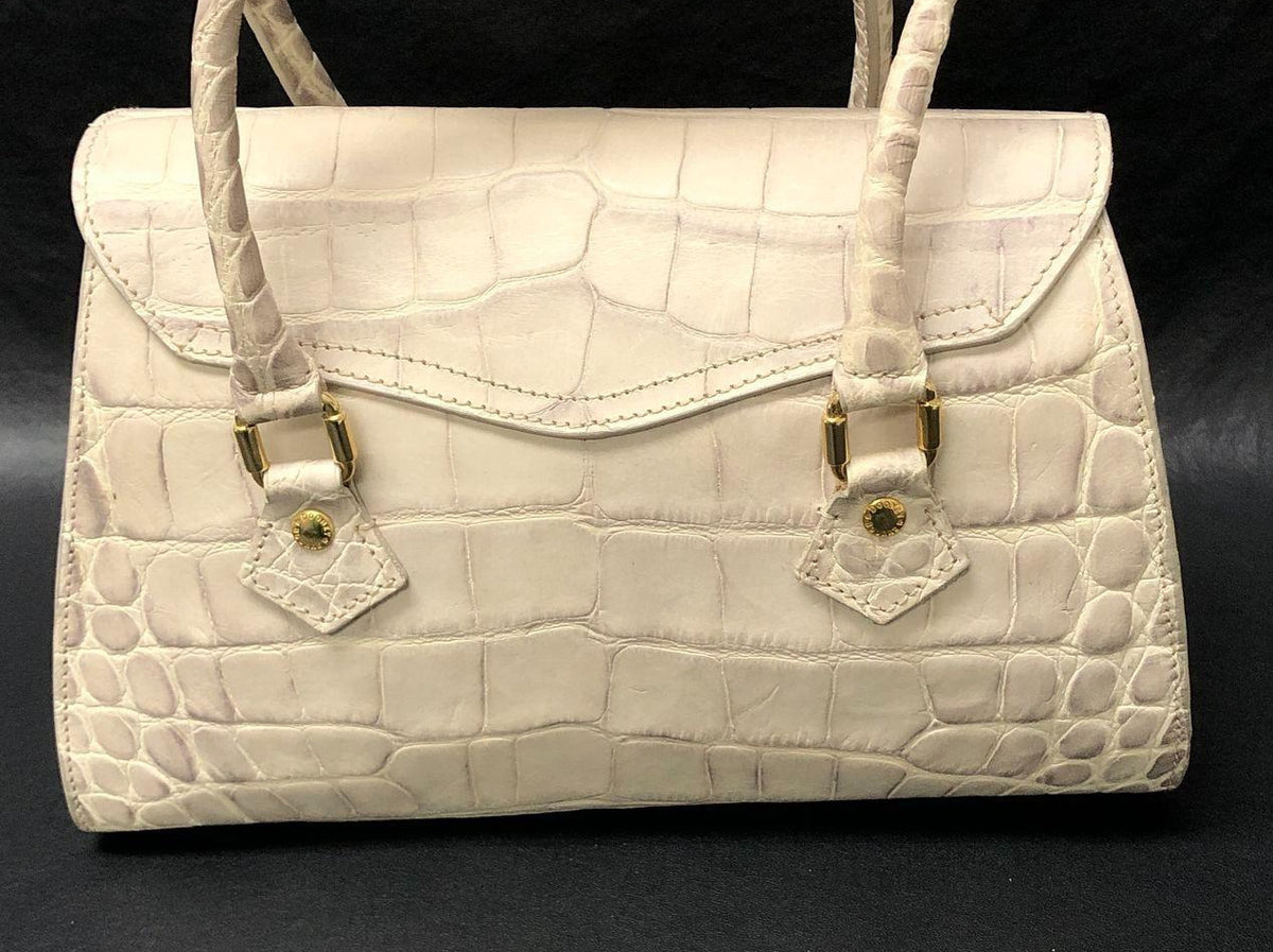 Dooney and Bourke white croc-embossed satchel with gold-tone turn-lock and logo medallion, view 4