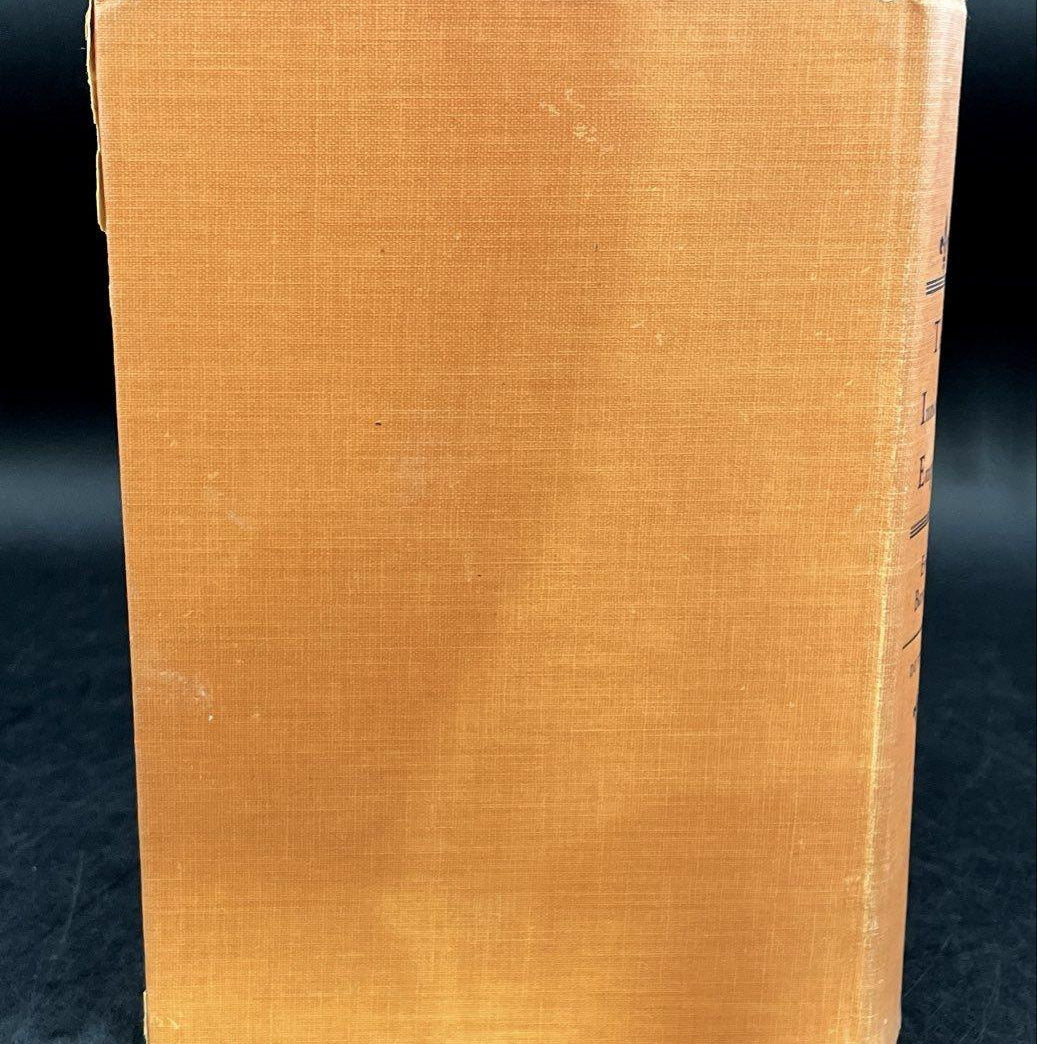 The Innocent Empress by Erna Barschak, orange-tan cloth hardcover with fleur-de-lis stamping, view 7
