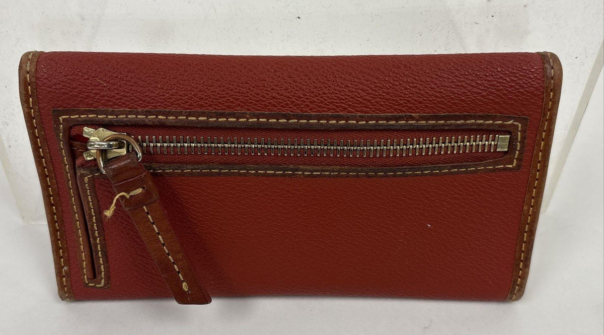 Dooney and Bourke red-brown pebbled envelope wallet with gold-tone 1975 plaque, view 3