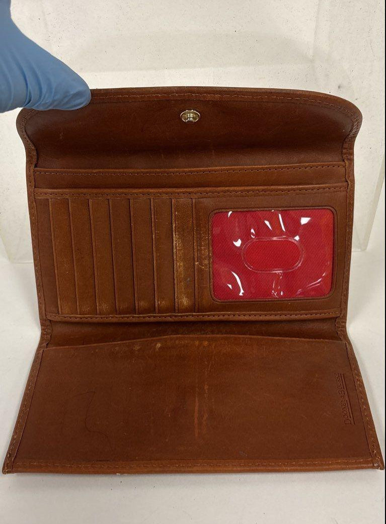 Dooney and Bourke red-brown pebbled envelope wallet with gold-tone 1975 plaque, view 4