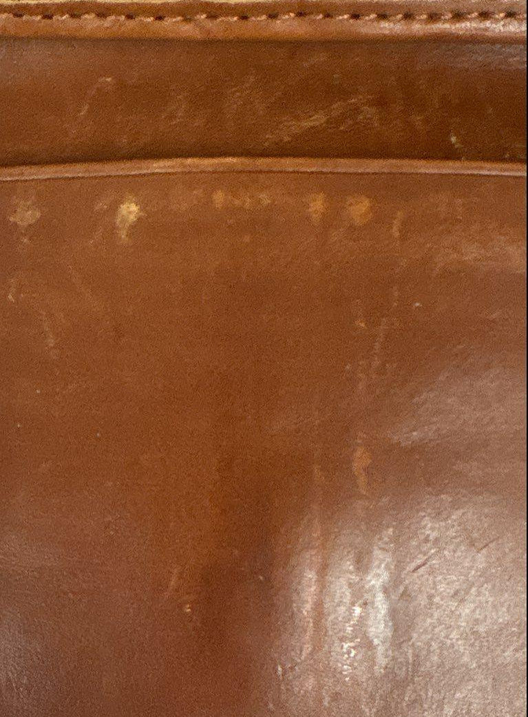 Dooney and Bourke red-brown pebbled envelope wallet with gold-tone 1975 plaque, view 8