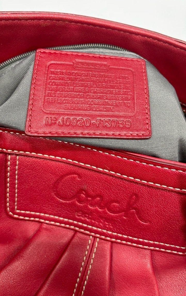 Coach chili red pebbled leather convertible tote with silver-tone buckle handles and ruched center panel, view 7