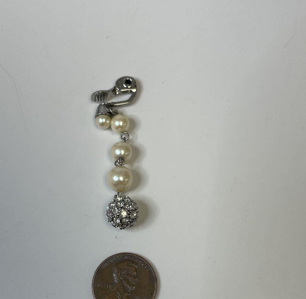 Monet silver-tone clip-on dangle earrings with cream faux pearls and rhinestone pavé ball drops, view 3