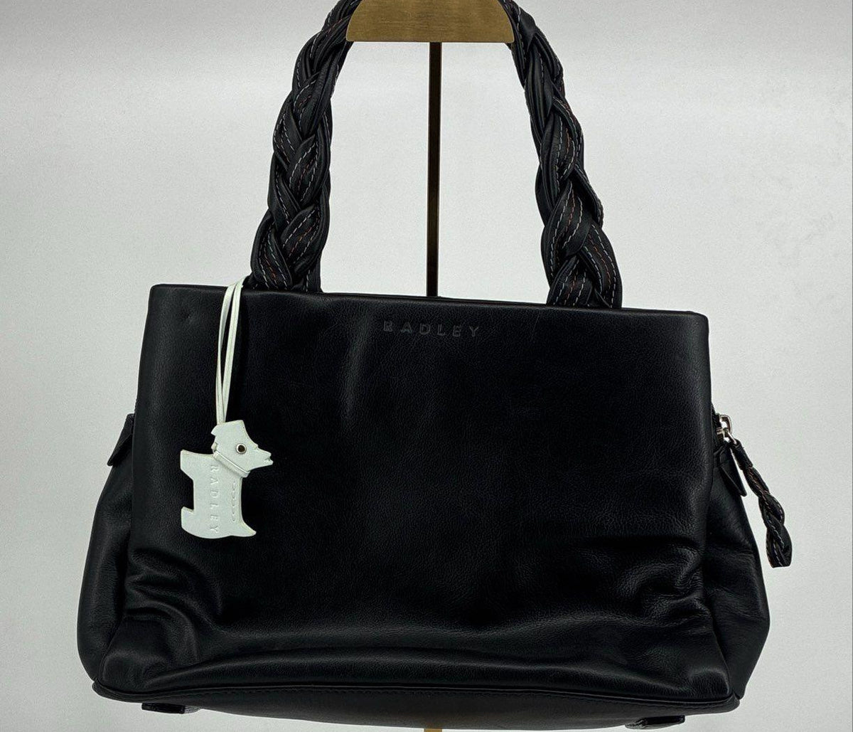 Radley London black leather shoulder bag with braided handles and white Scottie dog charm, view 2