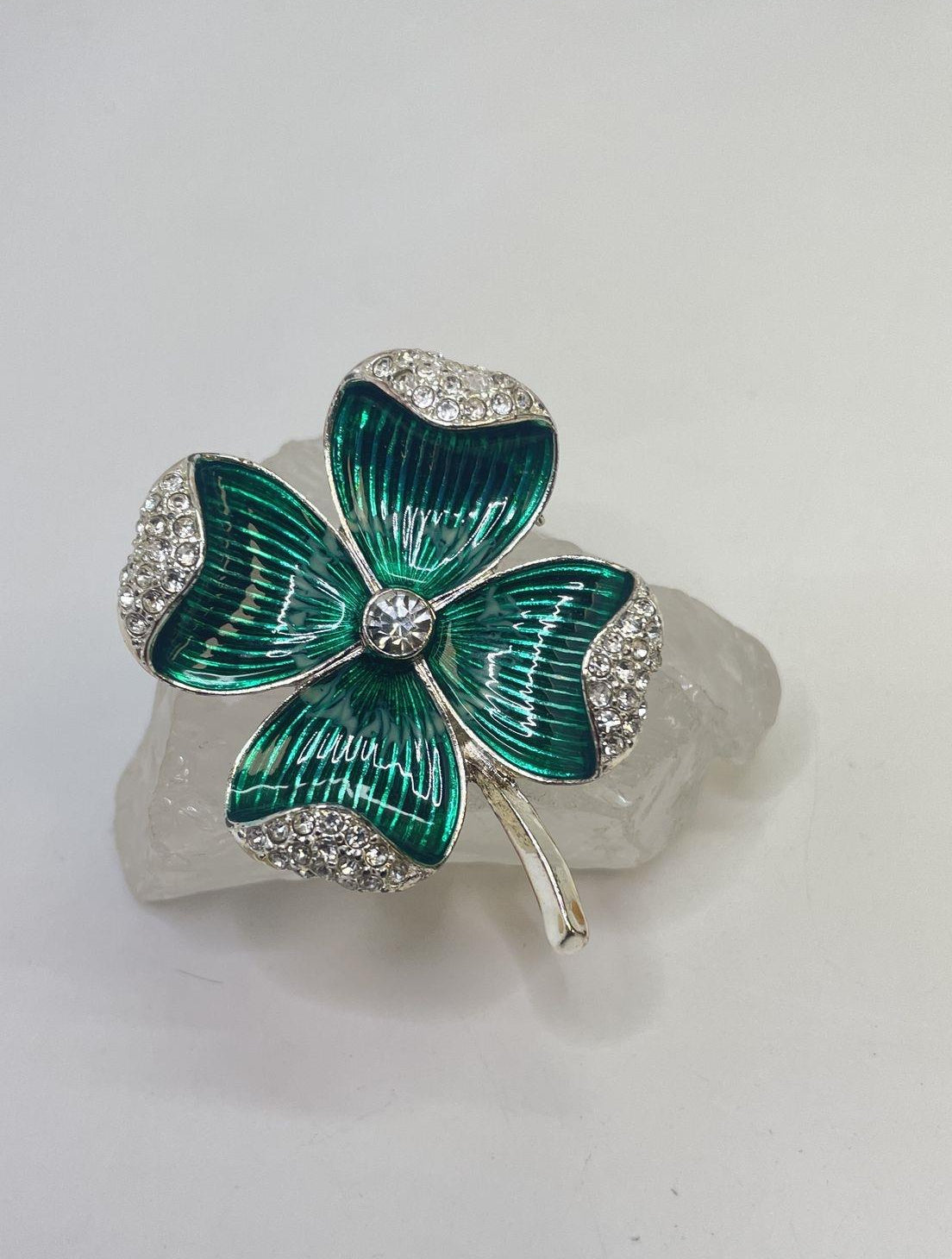 Silver-tone clover brooch with folded green rhinestone leaves, view 2