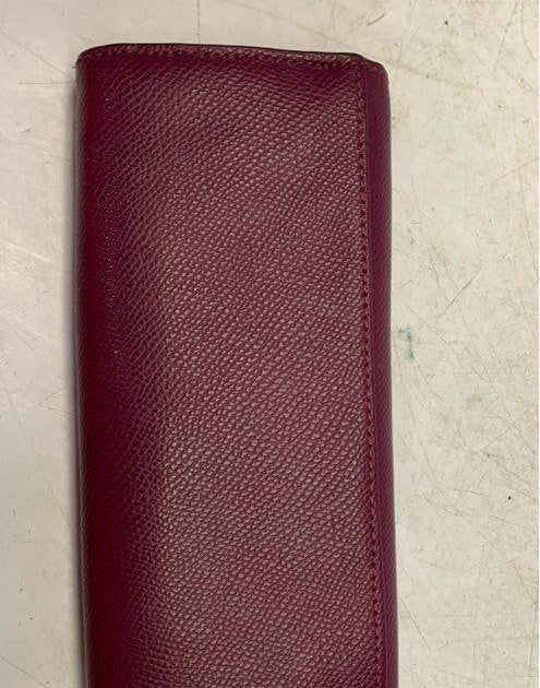 Coach burgundy leather snap flap wallet with gold-tone hardware and floral print interior, view 6