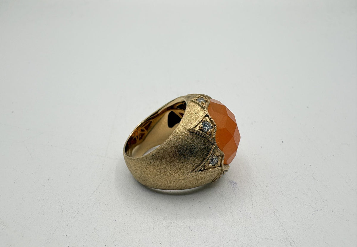 Gold-tone ornate statement ring with faceted amber-orange center stone, view 4