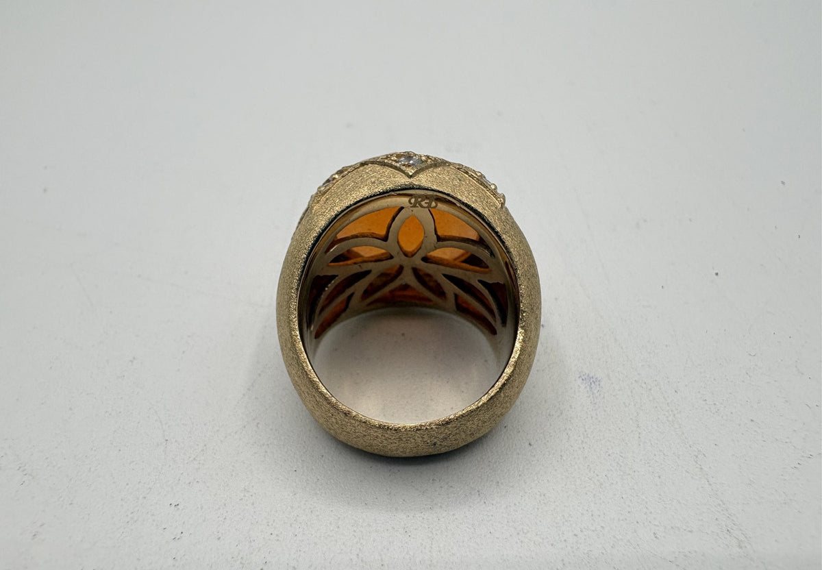 Gold-tone ornate statement ring with faceted amber-orange center stone, view 5