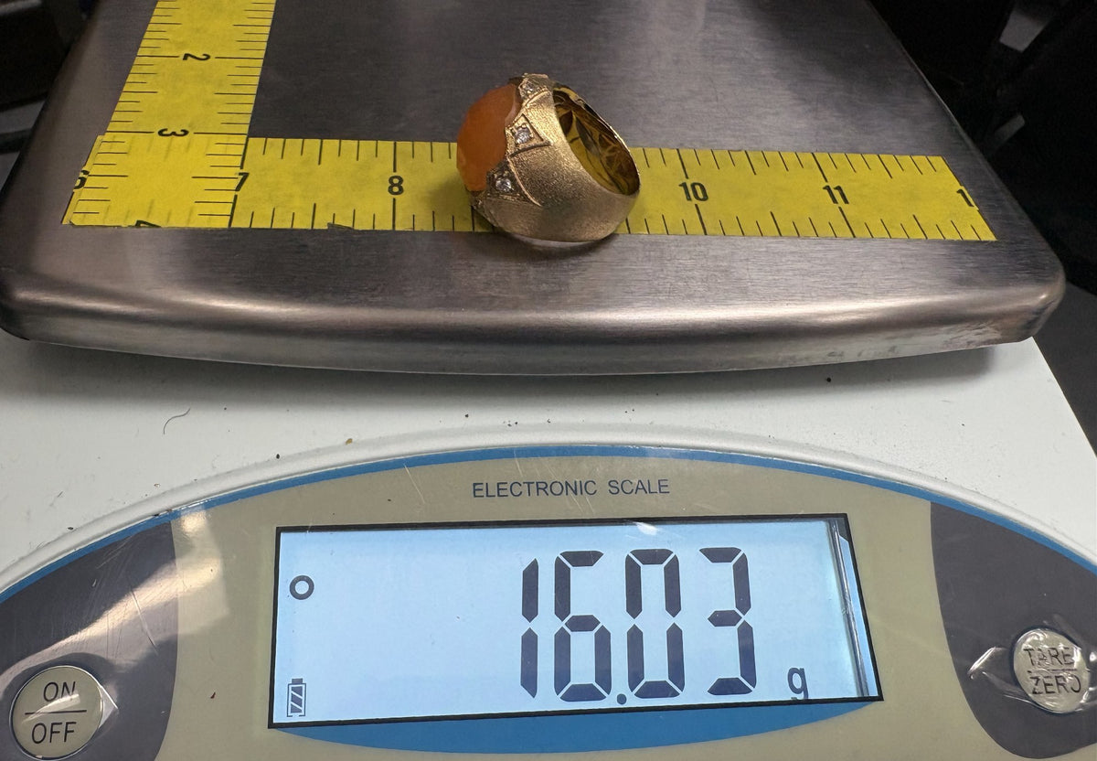 Gold-tone ornate statement ring with faceted amber-orange center stone, view 8